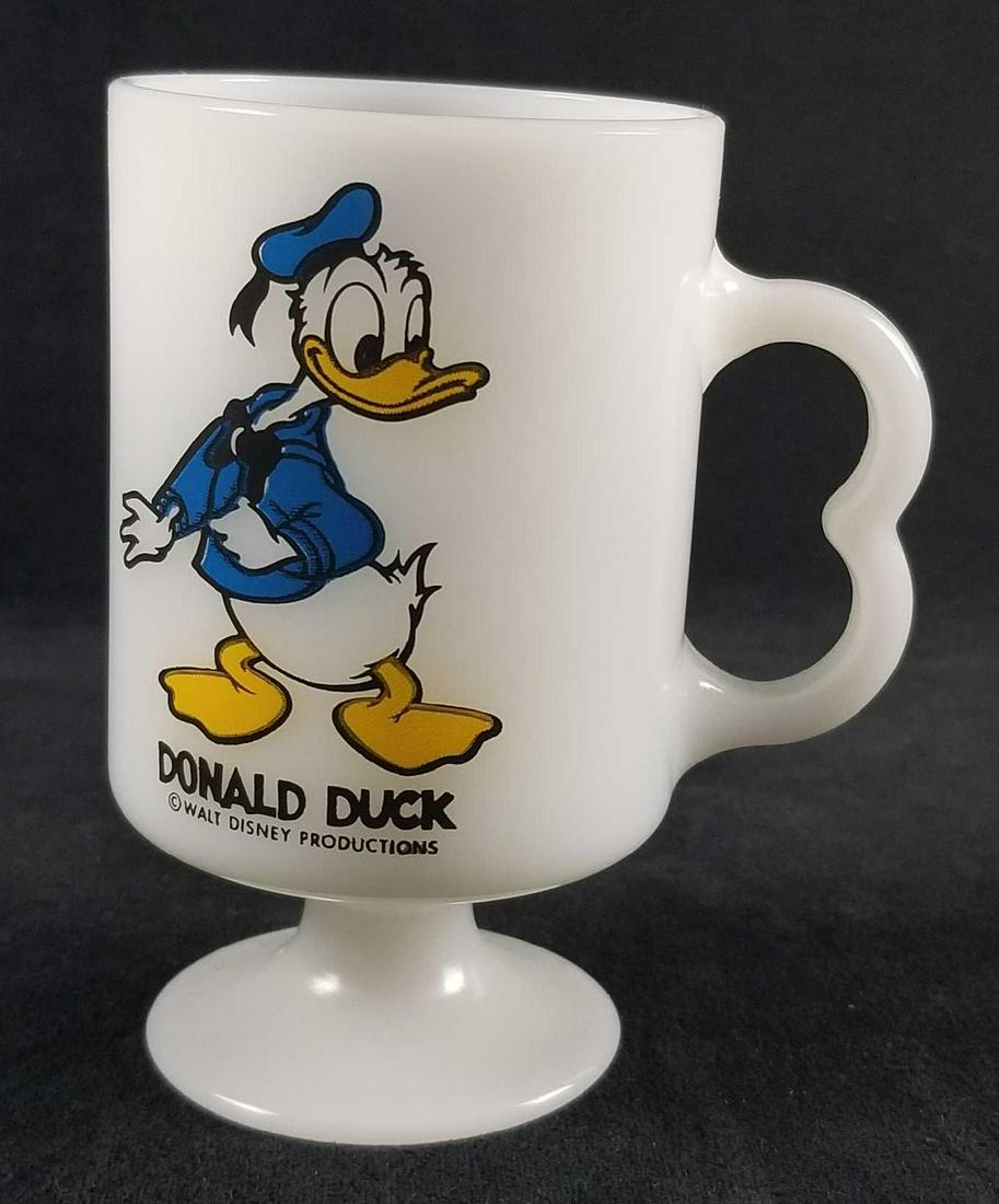 Vintage Donald Duck Walt Disney Productions Milk Glass: Vintage Donald Duck by Walt Disney Productions Milk Glass Cup or Mug. This milk glass cup is in good used condition with some minor scratches or scuffing (see images) and features a bold colored Curio