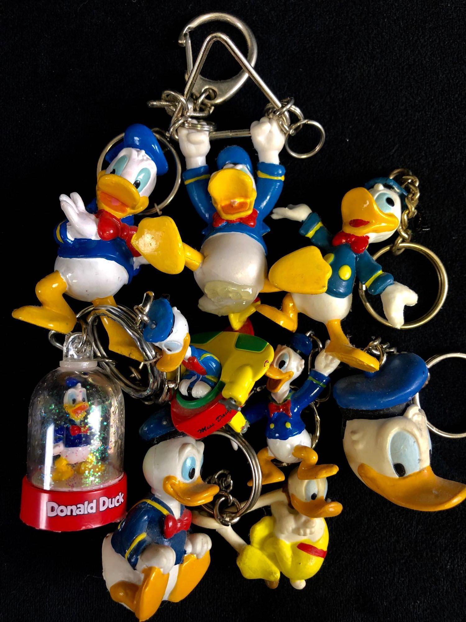 Lot of 9 Vintage figurine Donald Duck Keychains (1 of 8)