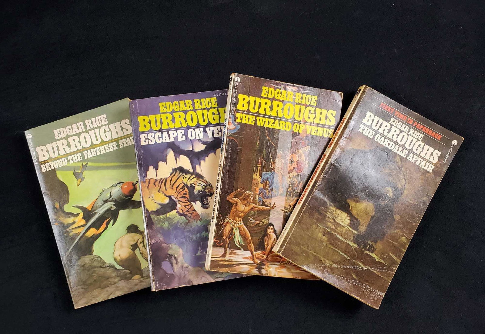 Vintage Lot Of Four Edgar Rice Burrough Acebooks: This lot includes vintage Acebooks soft-cover books. All are in good, vintage condition with only minor shelf-wear/yellowing of pages. Some books have book store stamp marks inside or original owner n