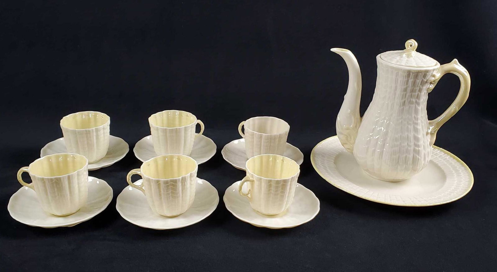 Vintage Belleek Coffee Tea Set: Vintage Belleek Coffee And Cake Set; This set comes with one coffee/tea pot (7 1/4" D x 7.25" H 4.0"D), 7 saucers ( each 4 1/4" D) , a desert plate (8 1/4" D) and 6 tea cupsÂ 3''x 2 1/2''x 2 1/3'' .