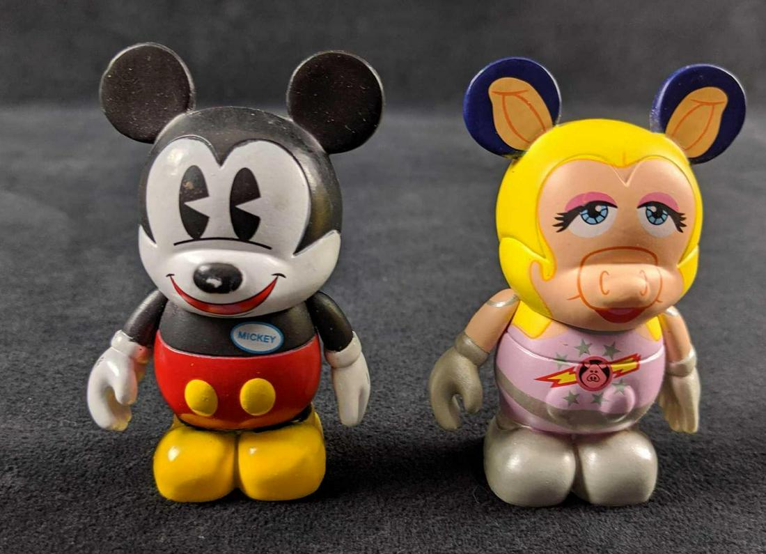 Disney Vinylmation Lot Of Two: This lot includes: 1.Â Disney 3" Vinylmation Muppets 2 - First Mate Miss Piggy: Pigs In Space. Figure is approx 2" x 3". This figure is in good, used condition with a few light scuffs. 2.Â Disney 