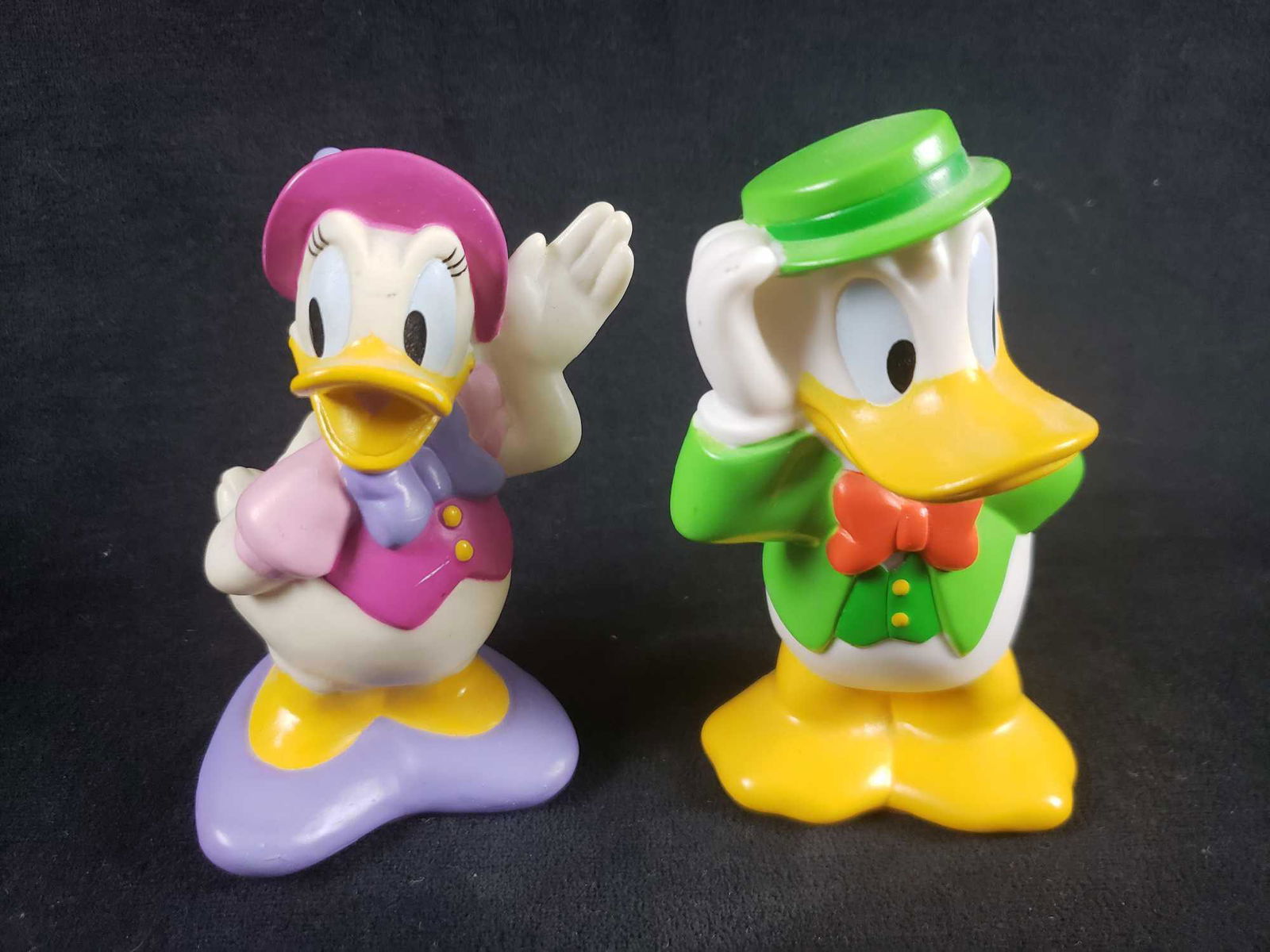 Bank of Tokyo Mitsubishi Bank Disney Donald Duck and: Bank of Tokyo Mitsubishi Bank Disney Donald Duck and Daisy Duck Vinyl Piggy Bank. This lot of Disney Donald and Daisy Duck piggy banks are in great used condition. The items have a slight amount of du