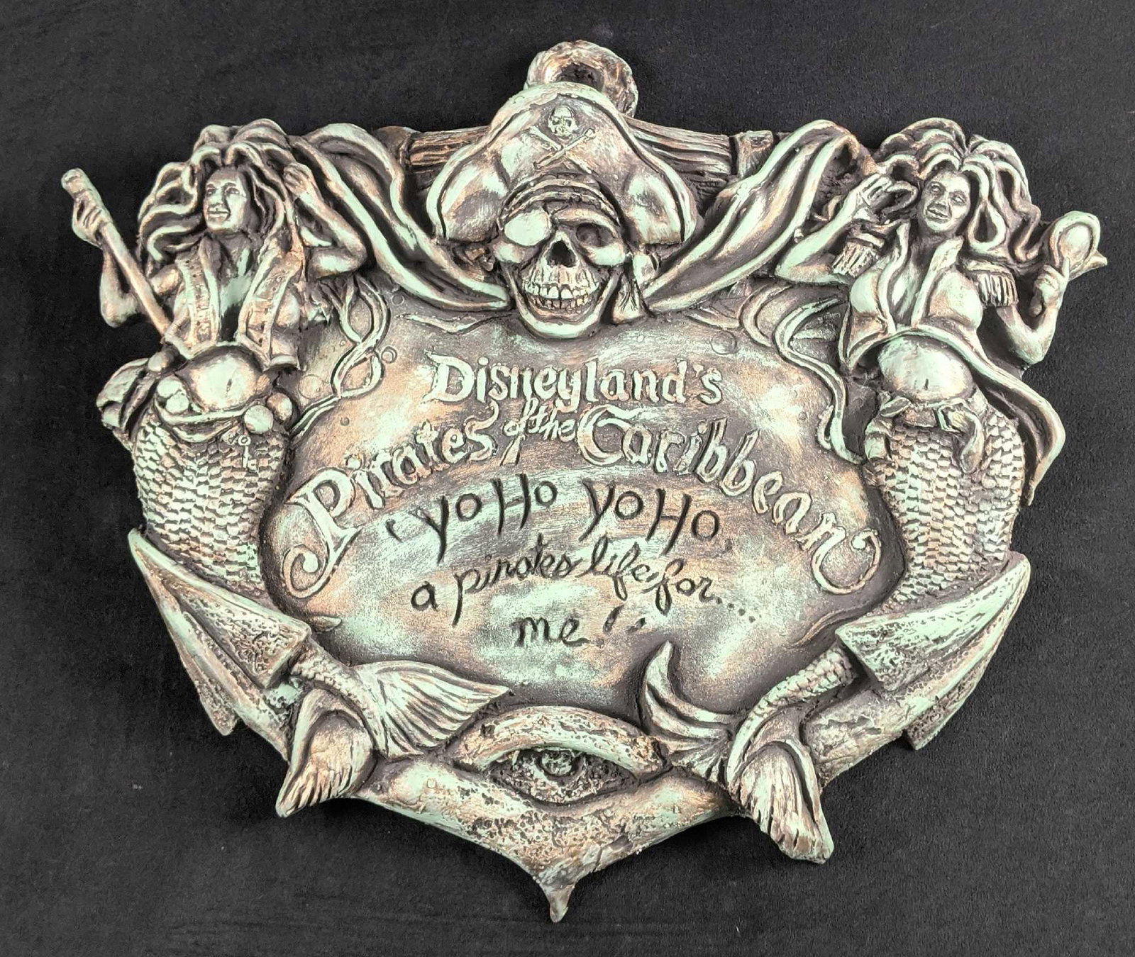 Rare Pirates of the Caribbean Disney Wall Plaque: RareÂ Pirates of the Caribbean Disney Wall Plaque. Perfect for your man-cave, living room, bedroom, or your own sturdy ship! Fun plaque is full of piratey detail with two sassy mermaids and ol' pira