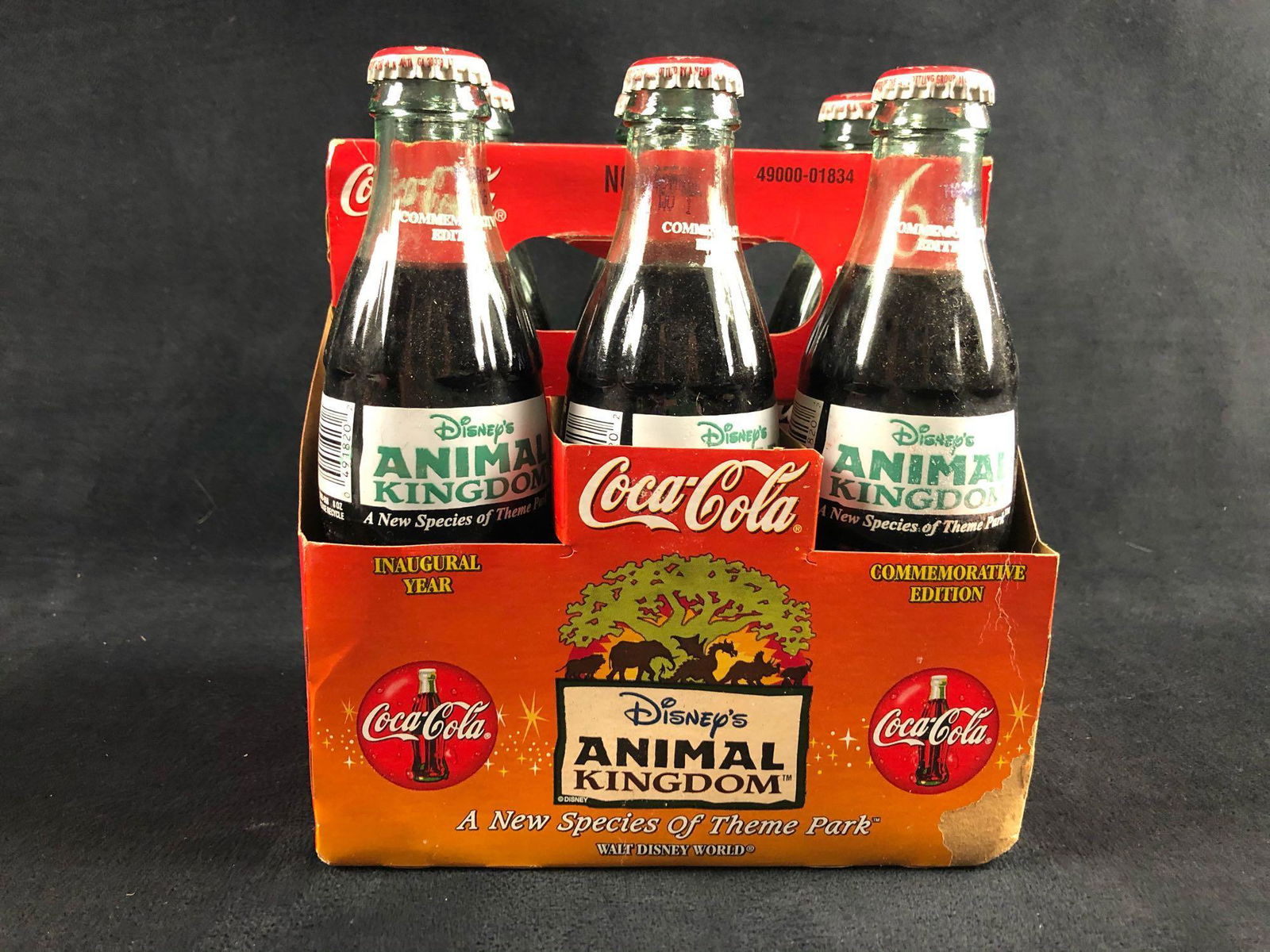 Vintage Coca Cola Disney Animal Kingdom Inaugural Year: Vintage Coca Cola Disney Animal Kingdom Inaugural Year Commemorative Edition 1998. This lot features 6 glass never opened Coca-Cola 8 oz bottles. This lot is only for the sale of the bottles not for t