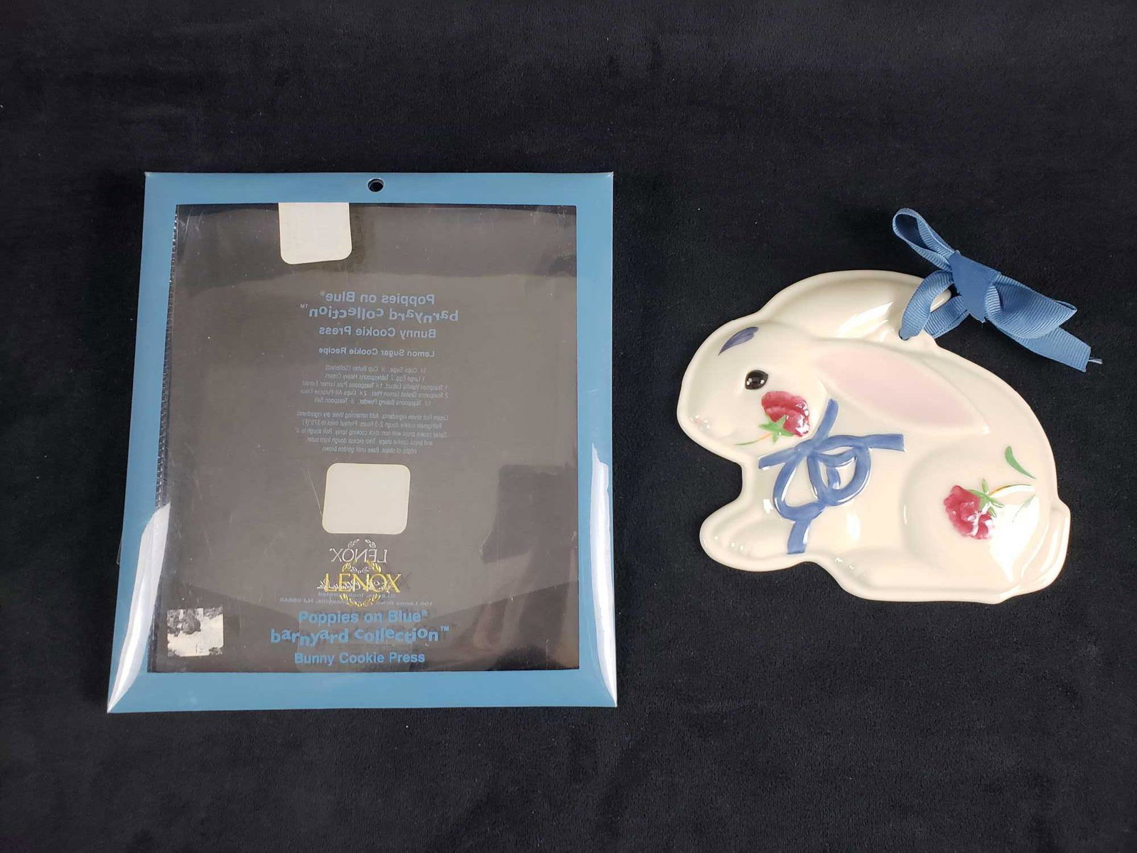 Lenox Poppies on Blue Barnyard Collection Bunny Cookie: Lenox Poppies on Blue Barnyard Collection Bunny Cookie Press. This bunny cookie press ornament is in great used condition. The cookie press comes in the original packaging and looks to have rarely, if