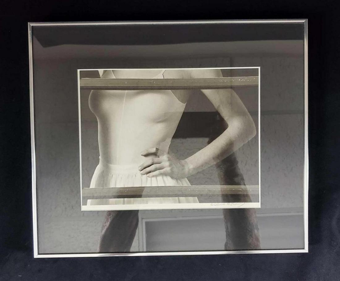 Signed Framed Black And White Photo Of Ballerina: Signed black and white photo of an close-up of a female ballerina. Photo is signed by what appears to be an William D Crowey. Image is approx 9 1/2 x 7 1/2". Frame is approx 15" x 13". Frame is in goo