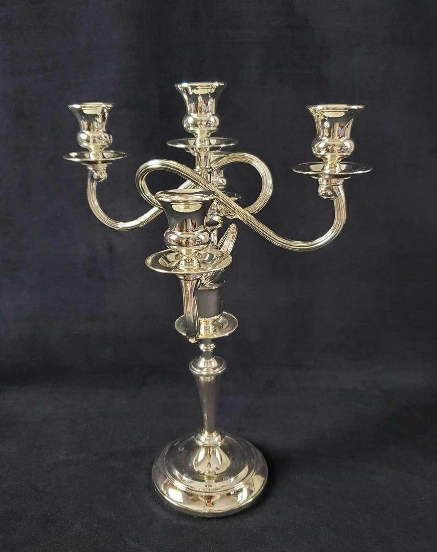 Vintage Silverplate 5 Light Candelabra WM A Rogers: Vintage silver-plated five-light Candelabra by W.m. A Rogers. Candelabra has a unique cross-over design with movable arms. It is in good vintage condition with some light scuffs and wax drips. Is appr