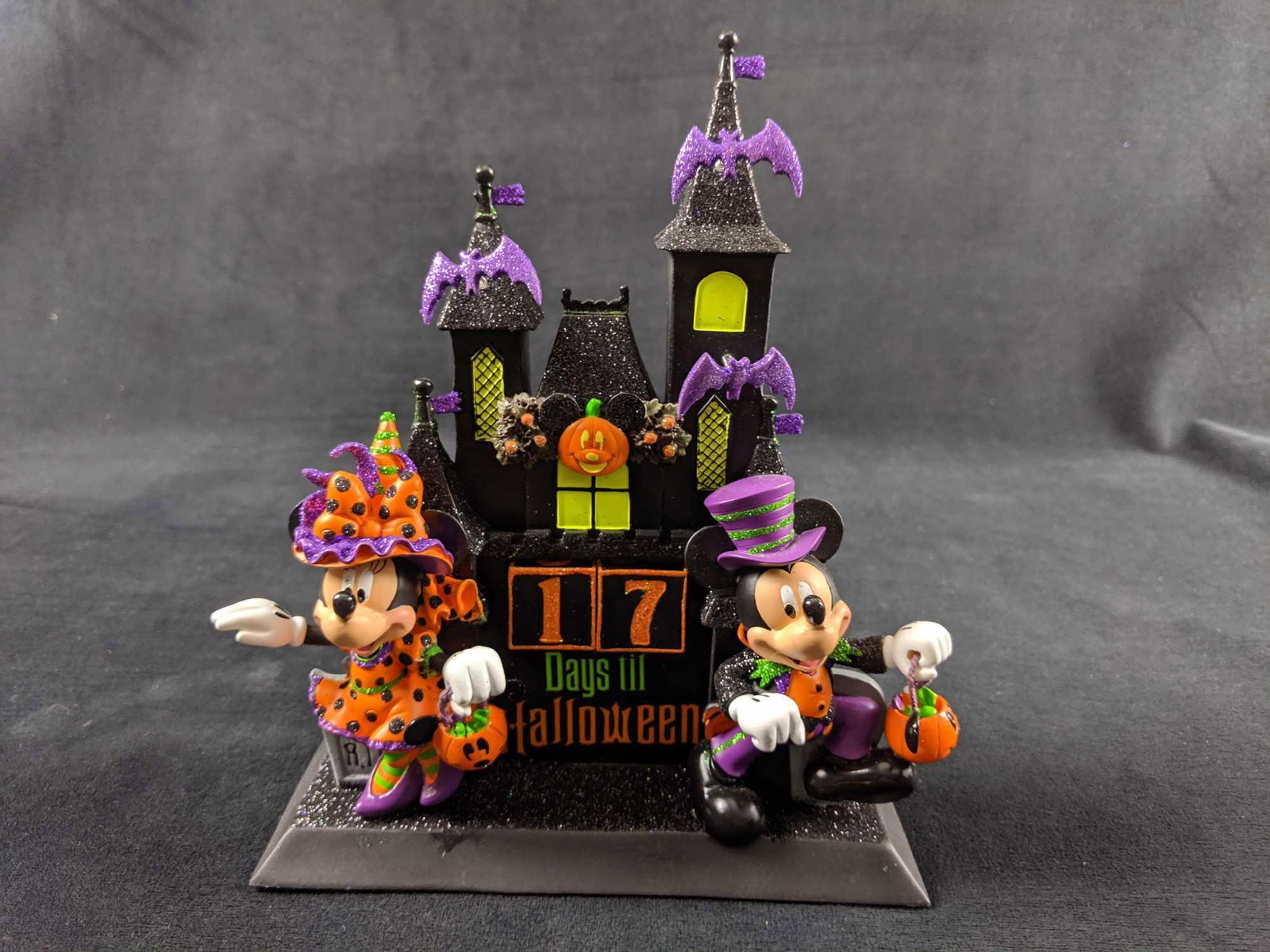 Disney Parks Halloween Countdown Calendar: Start the countdown to Halloween with Mickey and Minnie Mouse! This colorful and detailed haunted castle countdown calendar comes with two countdown "dice" that can be changed as the countdown slowly 