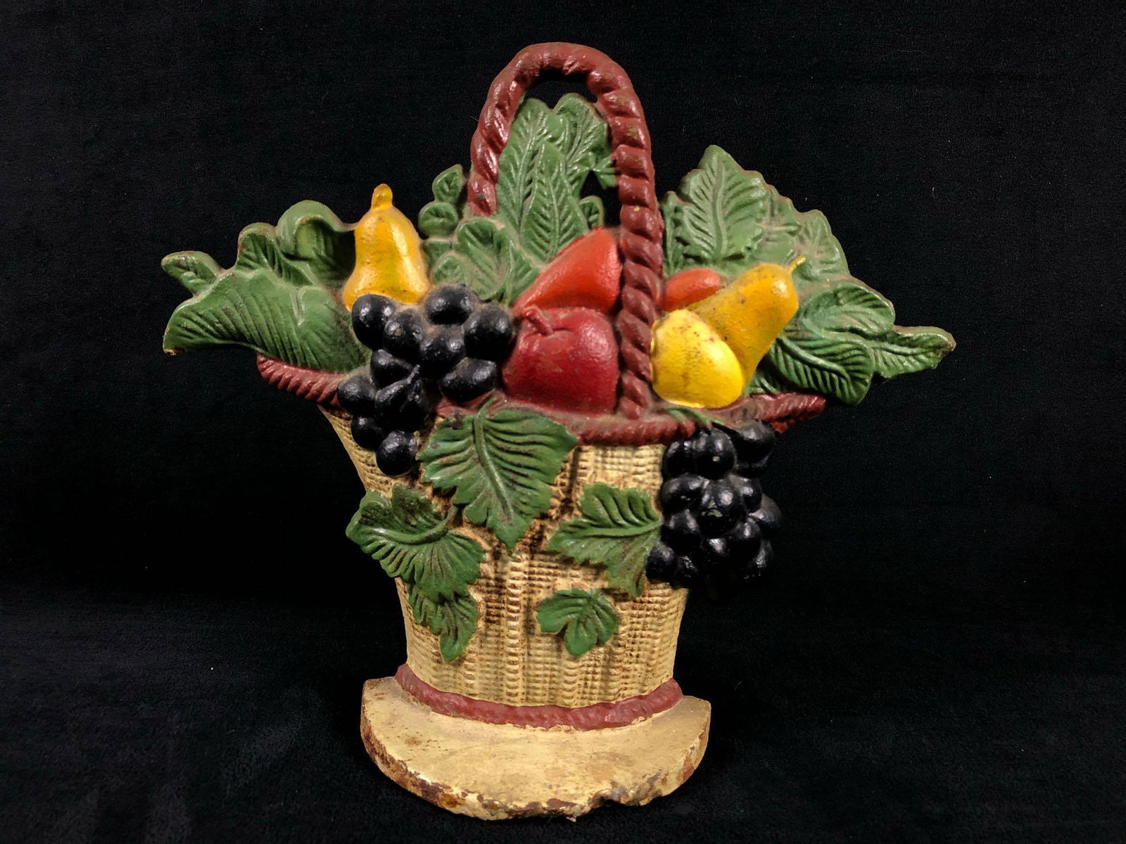 Antique Cast Iron Original Hand Painted Basket Of: Antique Cast Iron Original Hand Painted Basket Of Fruits & Vines Door Stop. This stunning item is in Good condition with sighs of paint loss and chipping can be expected. Amazing naturally distre