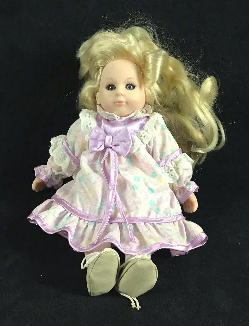 Vintage Circa 1900s Giga Toys Doll Little Girl: Vintage Circa 1900s Giga Toys Doll Little Girl. She is made of a flexible plastic. She has blue eyes and long blonde hair. She has removable clothes that include the following; dress, shorts, socks an