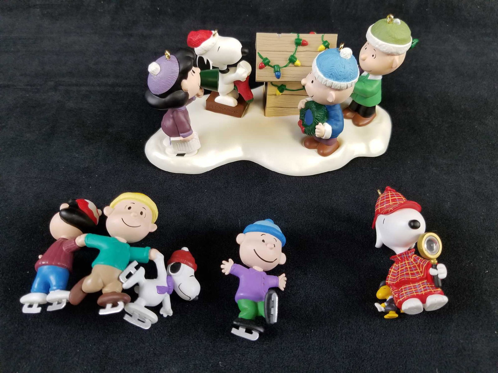 Lot of 7 Hallmark A Snoopy Christmas Ornament: This lot features: "Snoopy Ornament" (5th in the "A Snoopy Collection" series); handcrafted. "Woodstock on Doghouse" Display (1st in the "A Snoopy Collection" series);Handcrafted and dated 2000. "Lucy