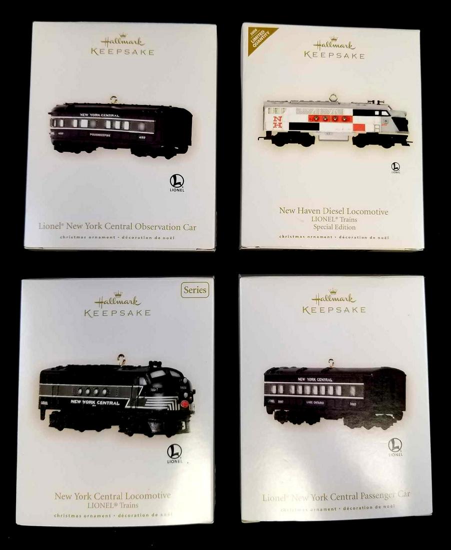 Lot Of 4 Hallmark Keepsake Lionel Trains: Upper Left: Lionel New York Central observation car. Upper Right: New Haven Diesel locomotive Special Edition with limited quantity. Bottom Left: New York Central locomotive Series Bottom Right: Lione