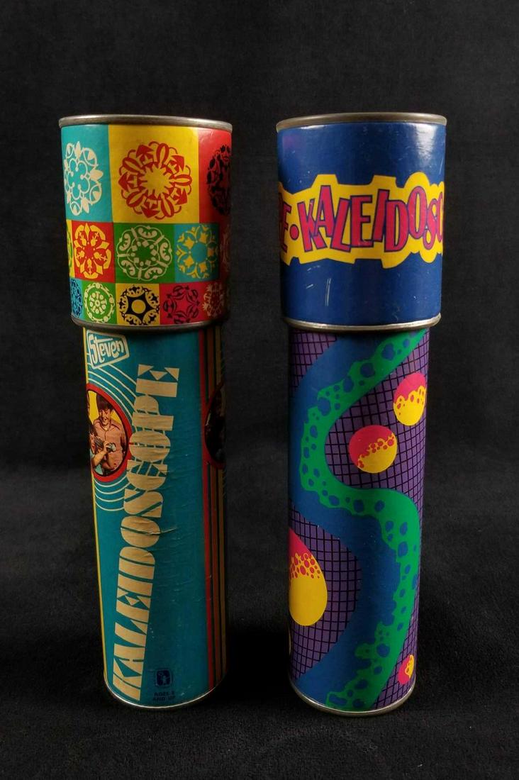 Lot of 2 Vintage Childrens Kaleidoscopes: This lot of 2 vintage Children's Kaleidoscopes consists of: (1) Steven Kaleidoscope. Manufactured in 1973 by Steven MFG. CO., Hermann, MO., U.S.A. The exterior depicts bold and bright colors with Mand
