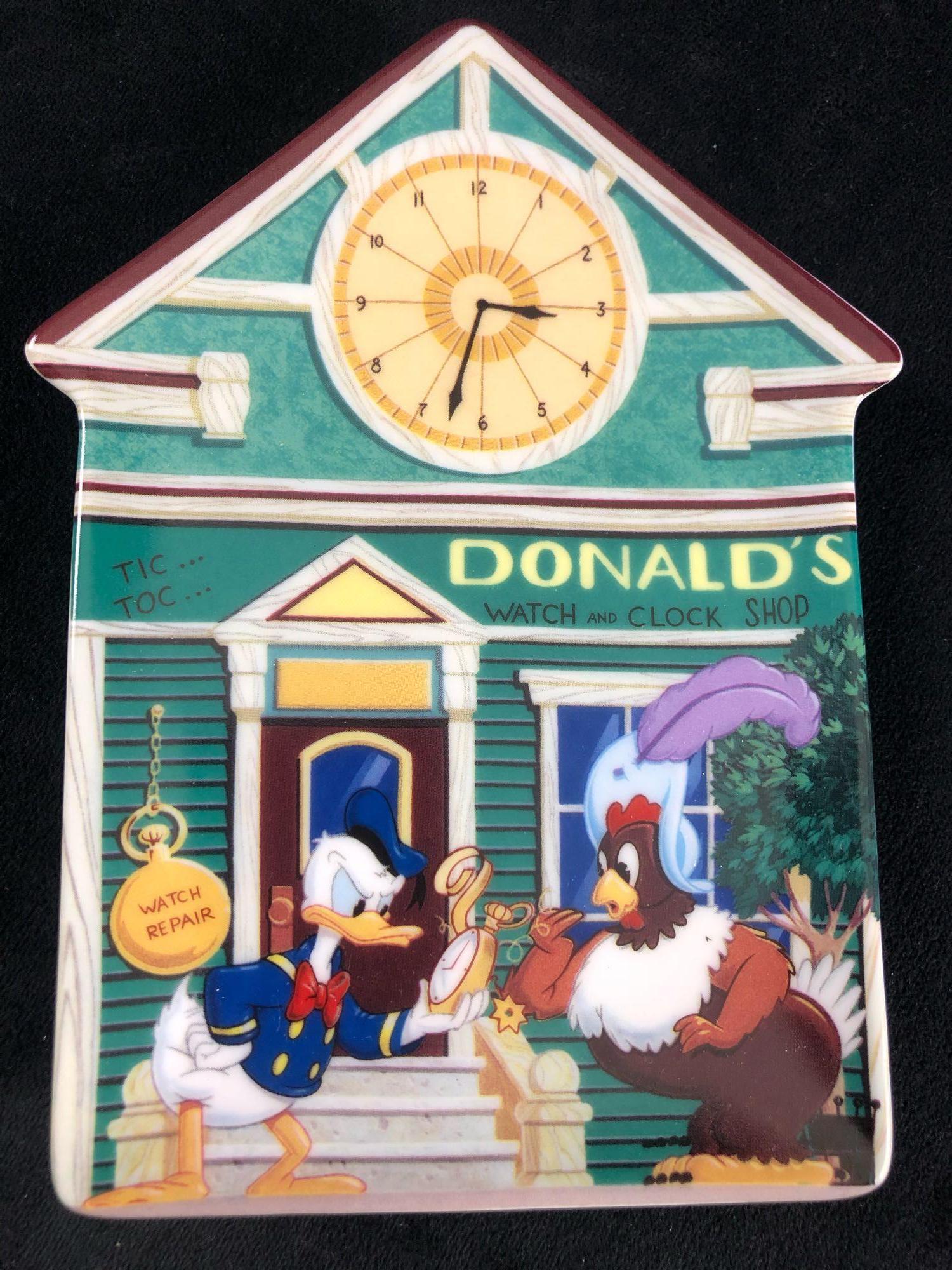 Vintage Disney Bradford Exchange Limited Edition Disney: Vintage Disney Bradford Exchange Limited Edition Disney Collector plate 1997 The cheerful image is fired on fine ceramic in bright, vibrant colors. "Donald's Watch and Clock Shop" - Sixth Issue, plate