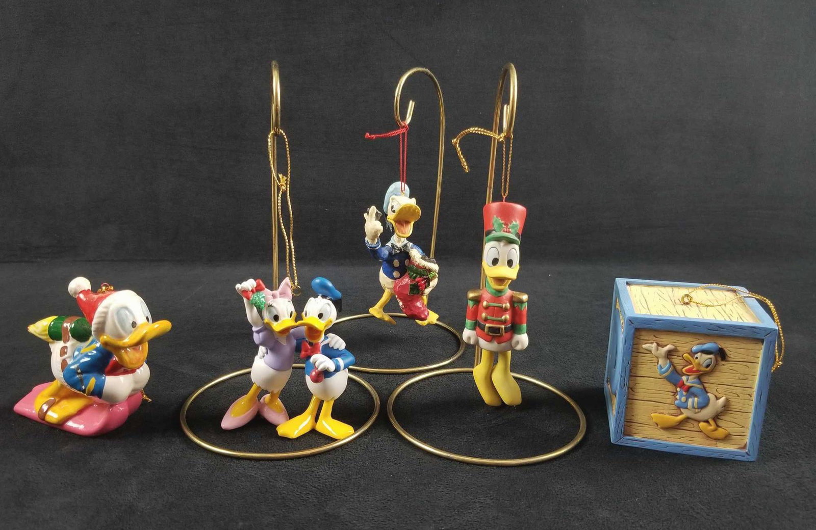 Lot of 5 Disney Donald Daisy Vintage Christmas: These ornaments appear vintage and would be a great addition to any tree. They go nicely together and add a variety of different textures and styles to a display. They are in good used condition with 