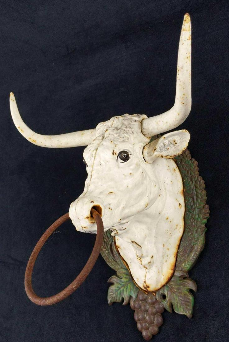 Vintage Country Cast Iron Bulls Head Towel Rack: Here are a vintage and very heavy cast iron bull's head towel rack. It could be used for its purpose as a rack for small towels, or even just as very unique wall decoration. Bull is approx 7" x 7" x 1