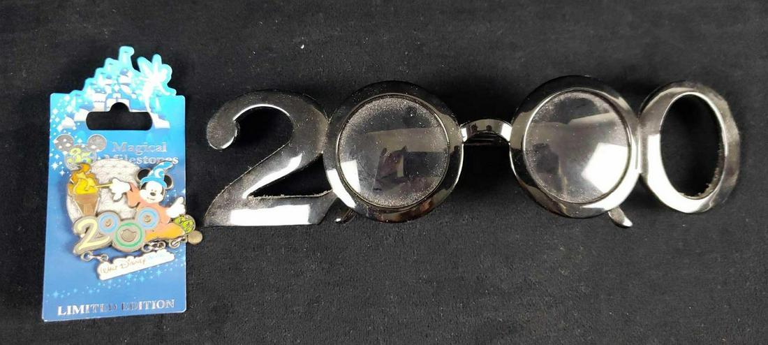 Disney Year 2000 New Years Sunglasses and 35th: Disney Year 2000 New Years Sunglasses and 35th Anniversary Magical Milestones Walt Disney World Limited Edition Pin. This year 2000 Disney lot is in overall great condition. The items show very little