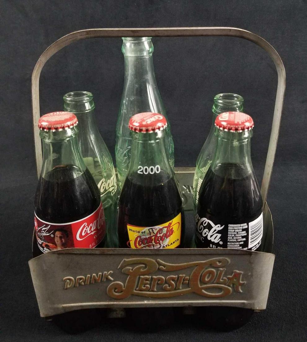 Lot of 7 Vintage Pepsi Cola Coke Metal Carrier Glass: Lot of 7 Vintage Pepsi Cola Coke Metal Carrier Glass Sealed Bottles Tony Steward Class of 2000 This collectible lot of Coca-Cola products features a variety of labels dedicated to an event. The vintag