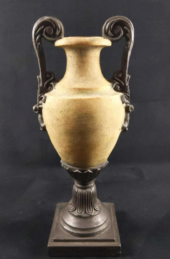 Vintage Like Plaster Grecian Style Pedestal Vase: From a distance, this appears to be a very old ceramic Grecian style vase, but it's actually a rather light vase made of plaster. The vase is in good, used condition with some minor wearing on the bot