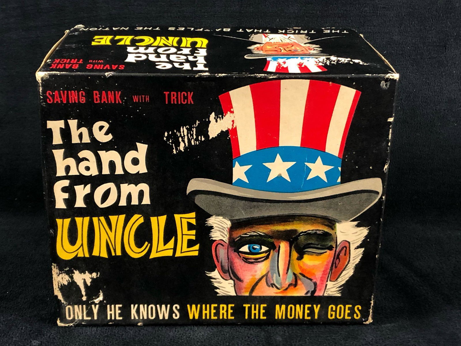 VINTAGE SPESCO JAPAN UNCLE SAM THE HAND FROM UNCLE COIN: VINTAGE SPESCO JAPAN UNCLE SAM THE HAND FROM UNCLE COIN BANK TOY NIB. THIS TOY BANK IS IN NEW CONDITION. BOX IS IN GOOD CONDITION