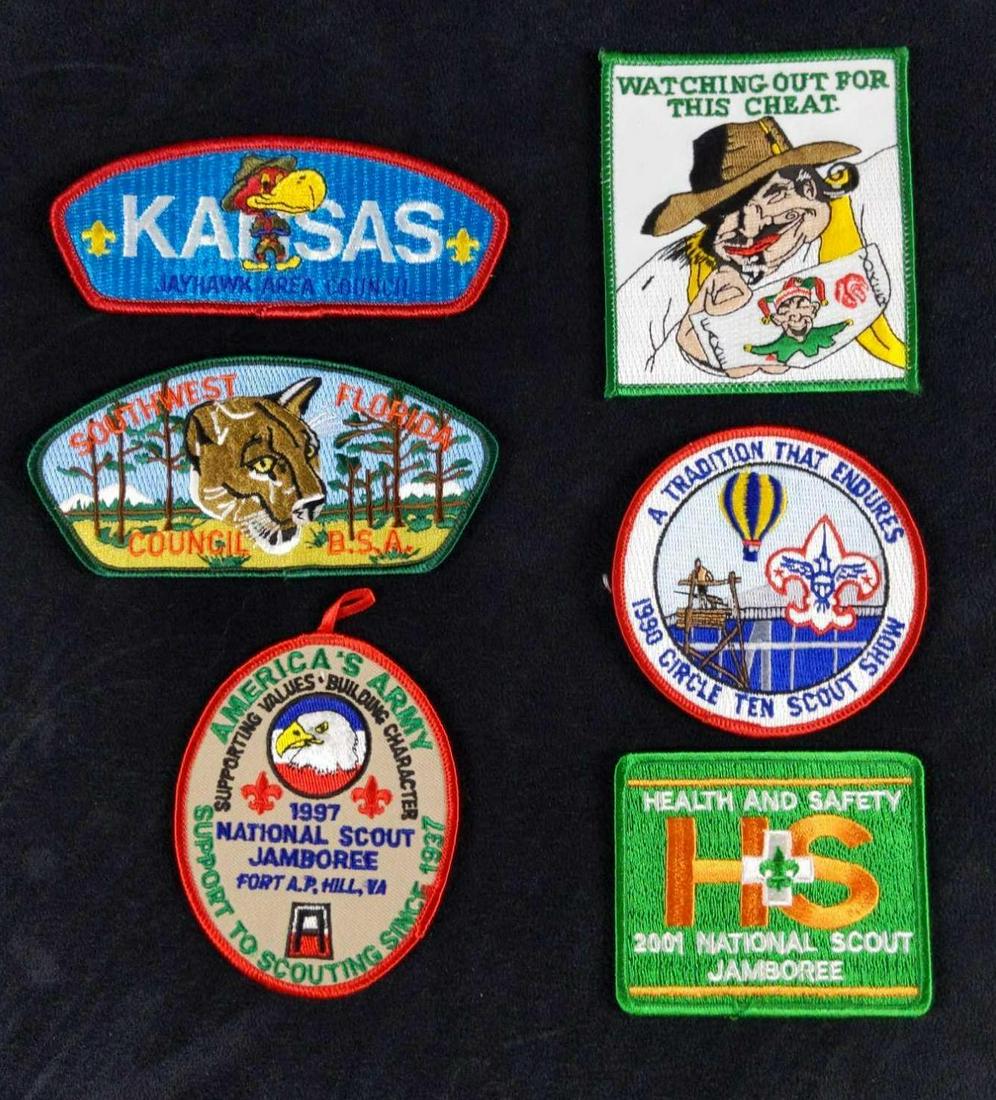 Official Boy Scouts Of America Patches Lof Of Six: This lot includes: (1) 1997 National Scout Jamboree Fort A.P. Hill, VA. Is approx 3" x 4". (1)Kansas Jayhawk Area Council Patch. Is approx 5" x 2". (1)1990 Circle Ten Scout Show. A Tradition That Endu