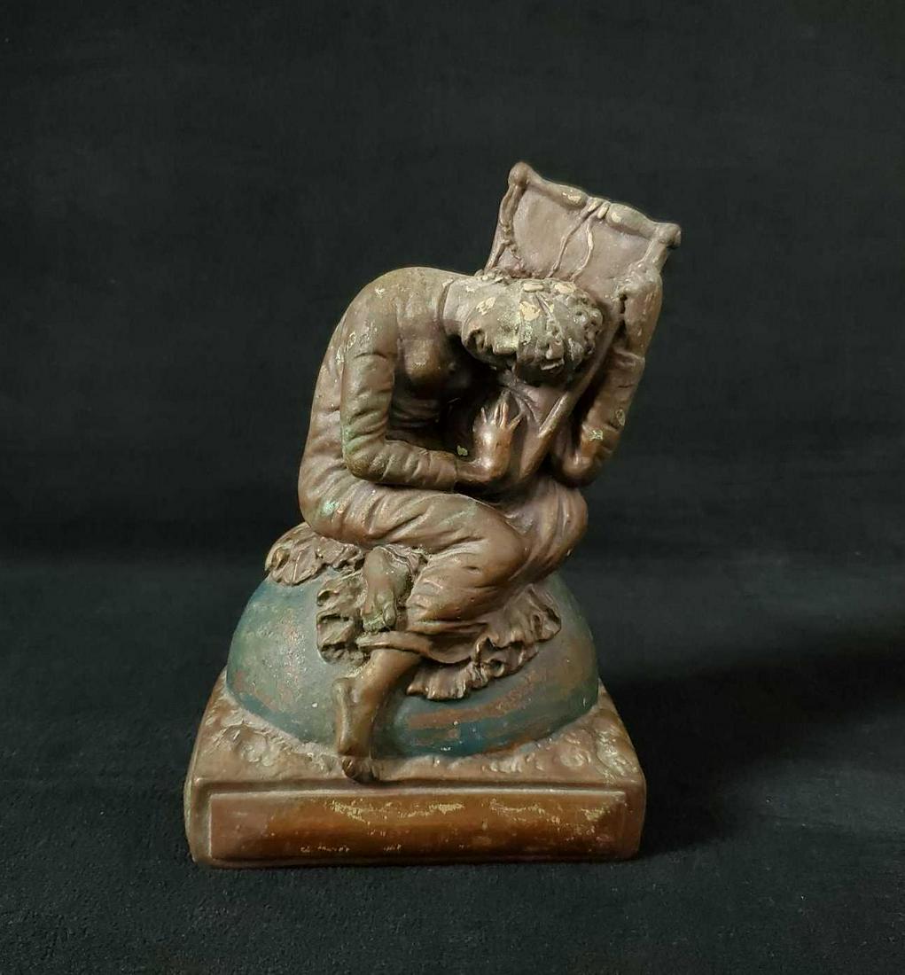 Vintage Lost Hope Bronze Single Bookend Statuette: K&O Art Nouveau "Lost Hope" 1932 Hollow Bronze Bookend Woman Playing Harp. This beautiful bookend depict a blind-folded woman playing a lyre sitting atop a world globe. Appears to be made by the Kronh