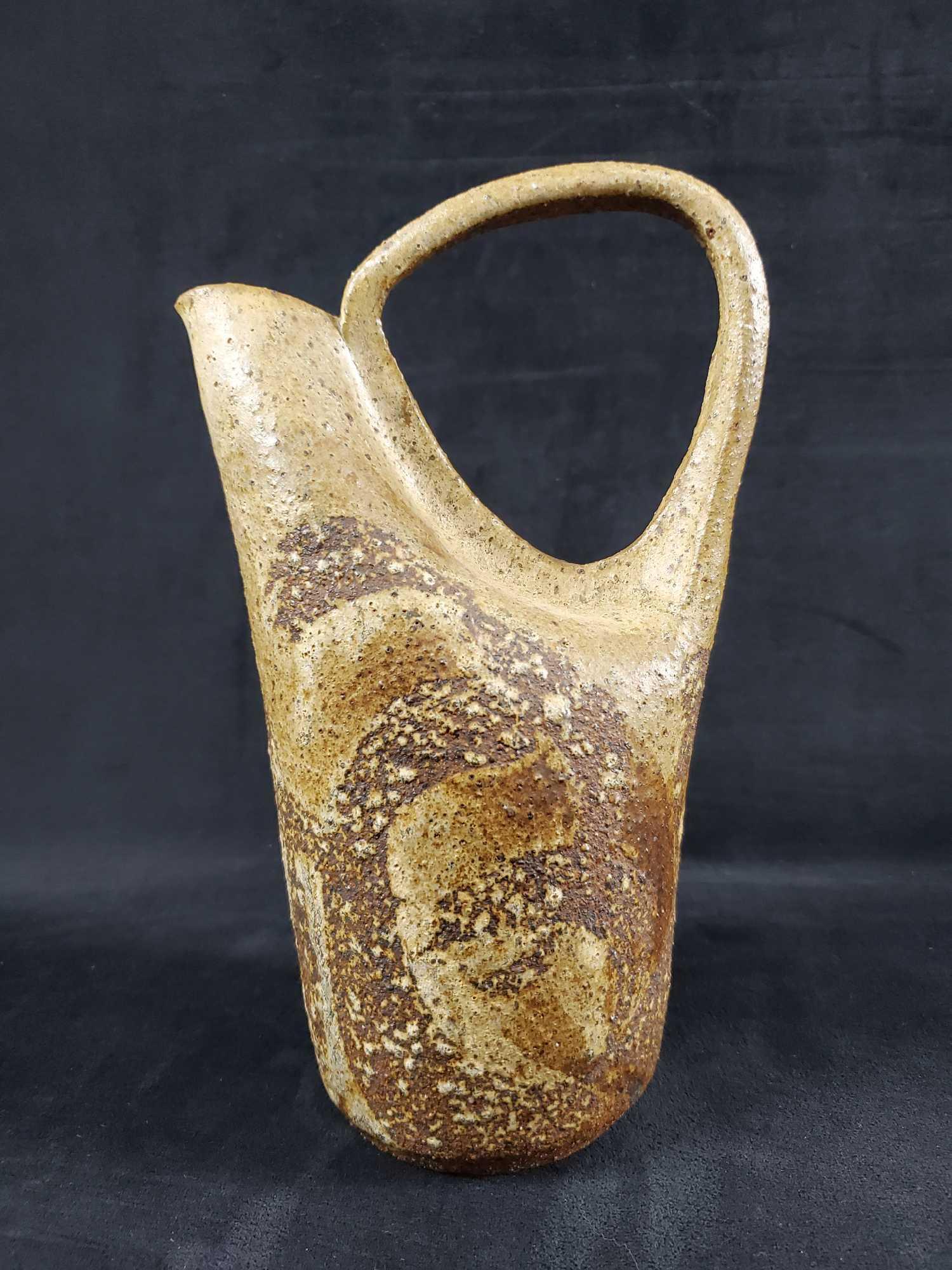 Vintage Hand Made Earthenware Water Jug: Hand made, heavy earthenware water jug. Glazed with an unique texture that gives it a real natural appearance. Jug is in good, vintage condition with no known damage, Is approx 6" x 4" x 10".