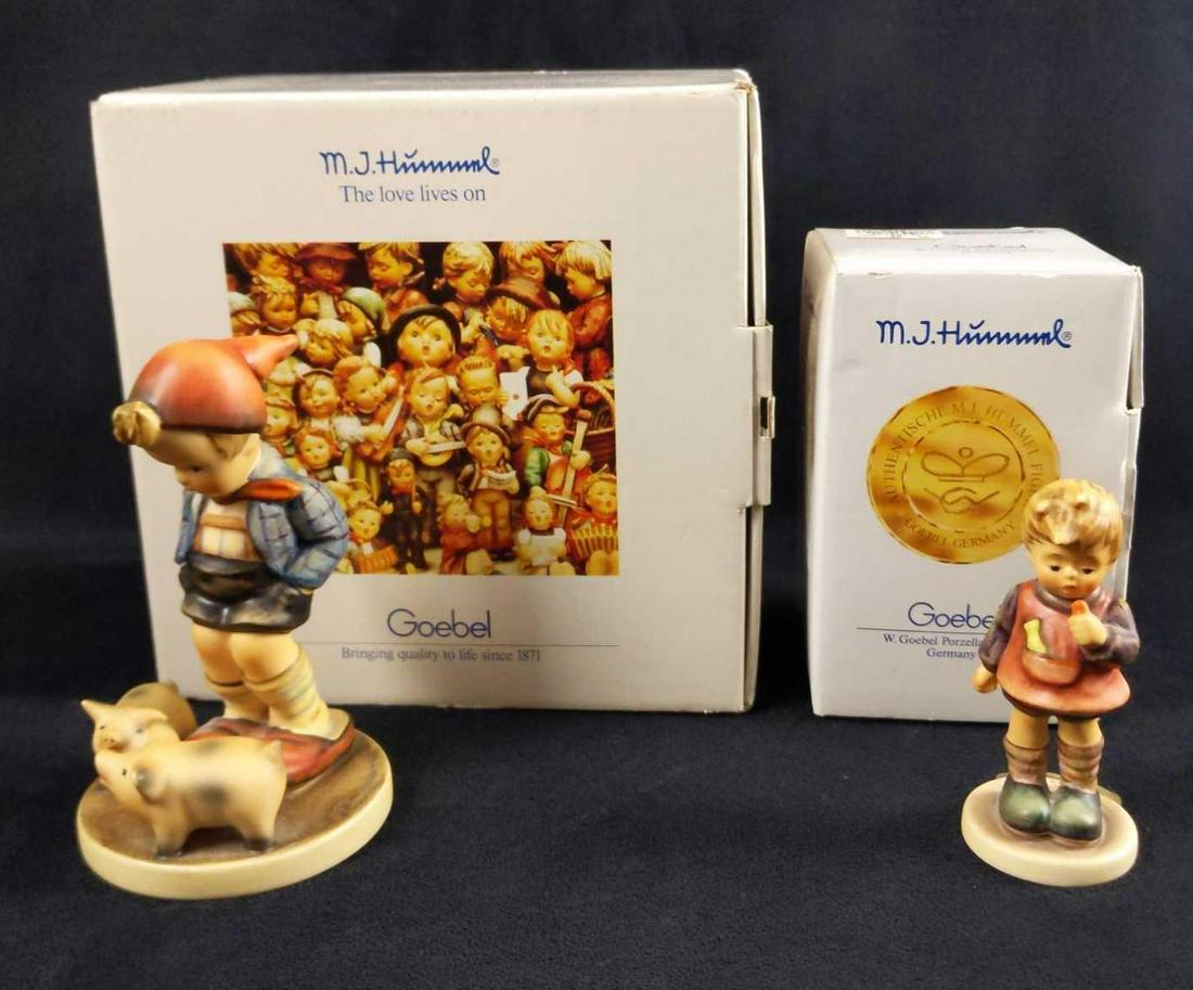 Two Vintage Goebel Hummel Figurines In Box W COA: Two vintage Goebel Hummel figurines with their original boxes and COA. This lot includes: (1) Delicious. TMK-7. #435. Box is approx 3 1/2" x 3 1/2" x 5 1/2". (1) Farm Boy. TMK-7. #66. Box is approx 8"