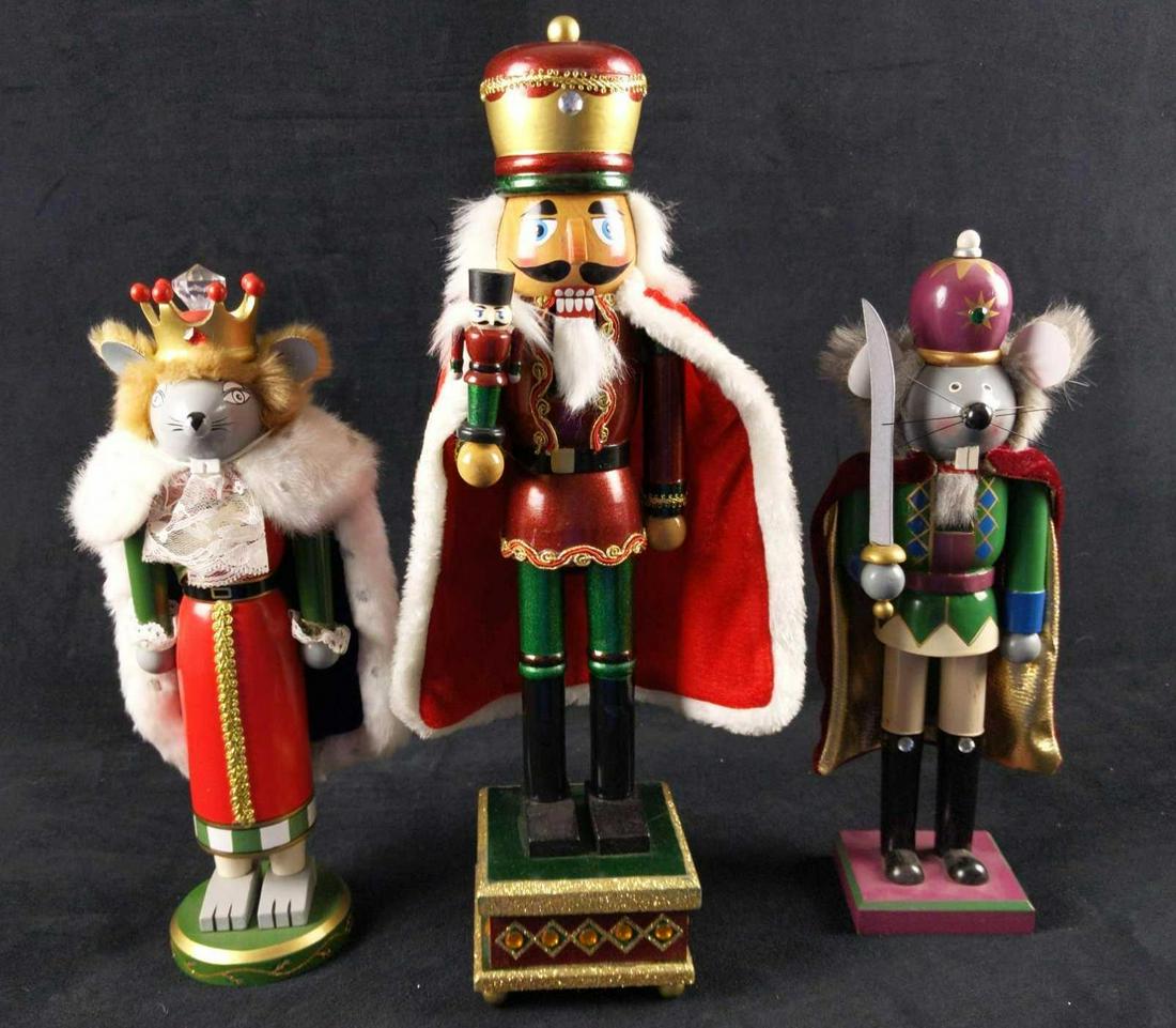 Three Wooden Nutcracker Themed Nutcrackers: Here are three actual nutcrackers based on the famous ballet, the 'Nutcracker". This lot consists of: (1) Mouse King. Is approx 3 1/2" x 3 1/2" x 14". The maker is unknown. (1) Mouse Knight. Is approx
