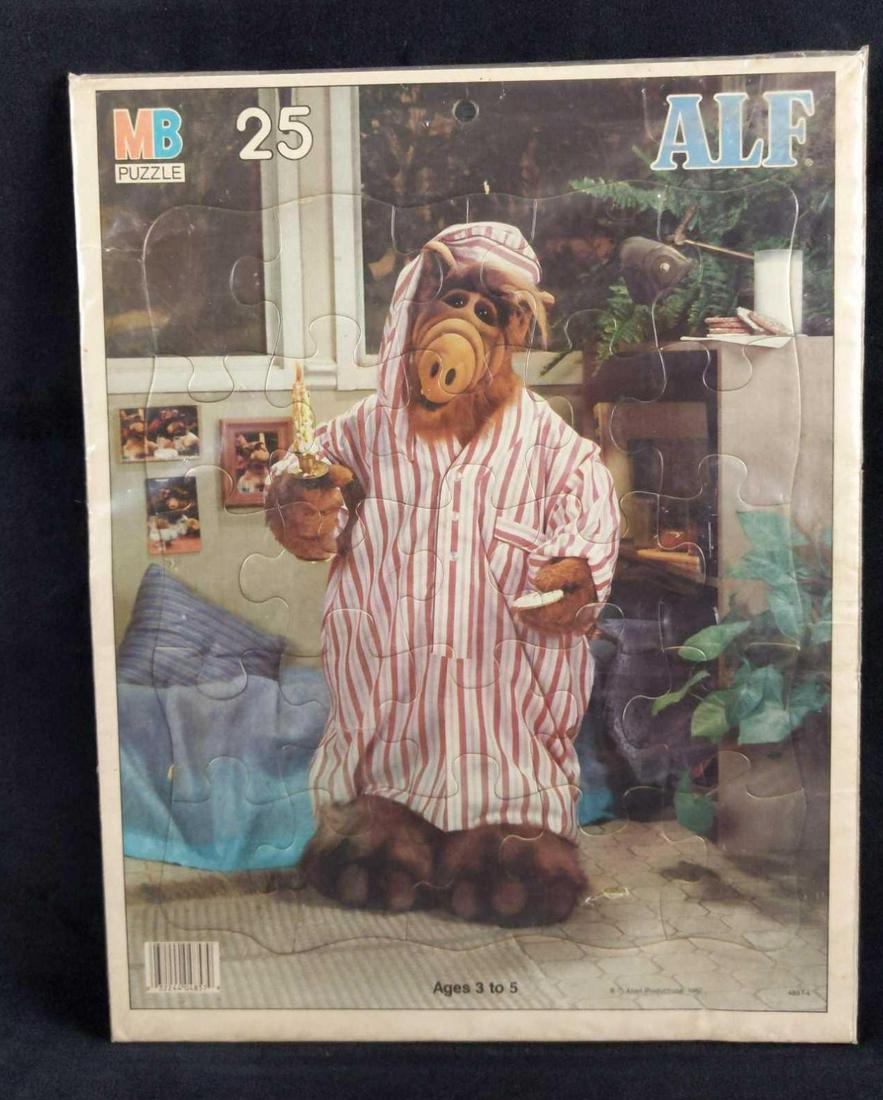 Vintage Milton Bradley ALF Puzzle: Large kid's puzzle of ALF, the lovable alien from the hit 1980's TV Sitcom of the same name. The puzzle is approx 11" x 14 1/2". The puzzle is in good, unused condition with no known damage. By Milton