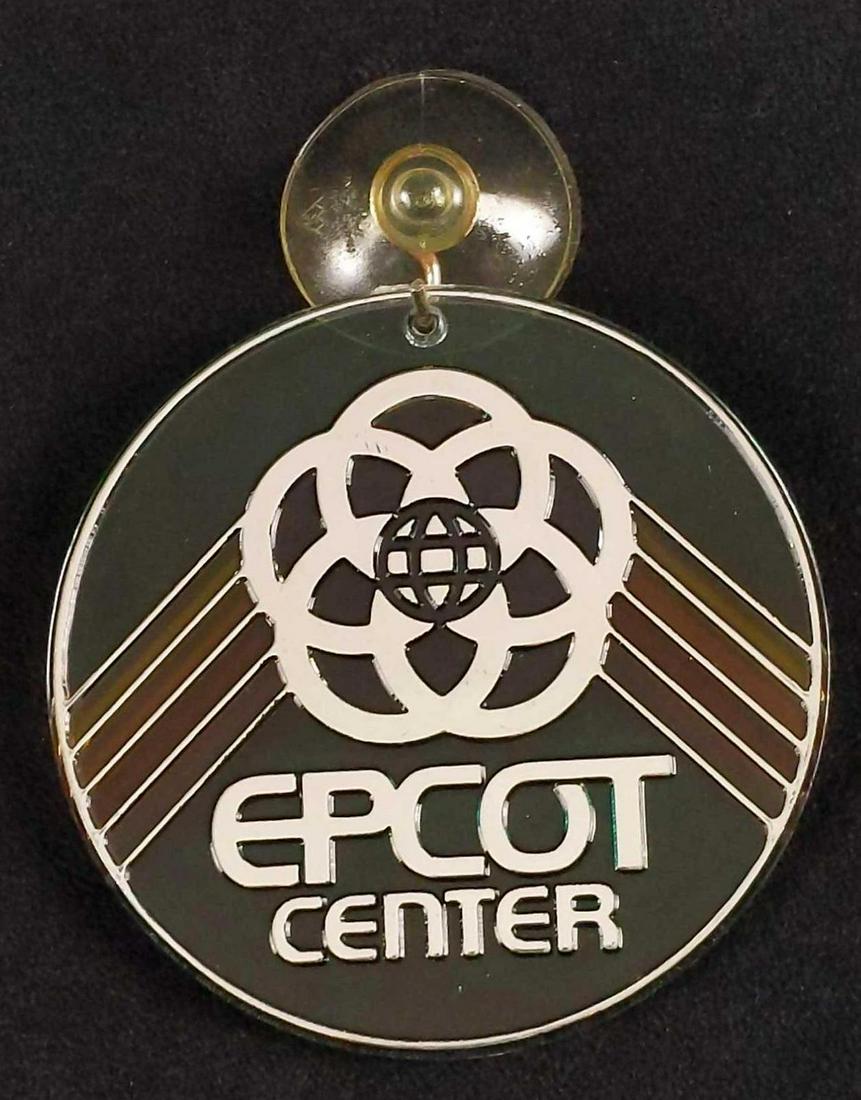 Vintage Disney Sun Beams Epcot Center Cling Sign: Here is a neat little Epcot Center 'Sun Beams' decoration to hang from a window or wall. Made to look like stained glass'. Sign is approx 4" x 4". Comes with a suction cup and original box which is ap