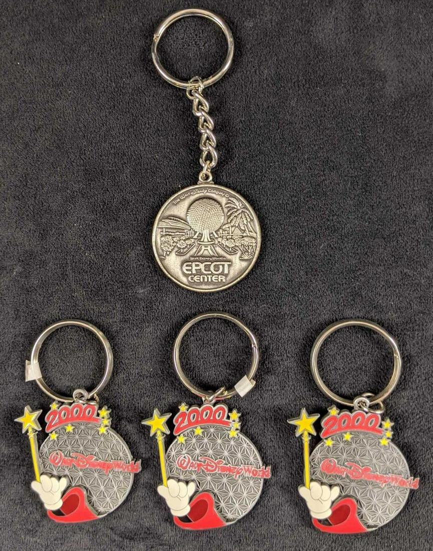 Lot Of Four Disney Epcot Pewter Keychains: This lot includes: Three Epcot Sorcerer Wand Keychains One Vintage (1982) Spaceship Earth Keychain Keychains are in good, used condition with no known damage. Are approx 2" x 3" to 2" x 4".