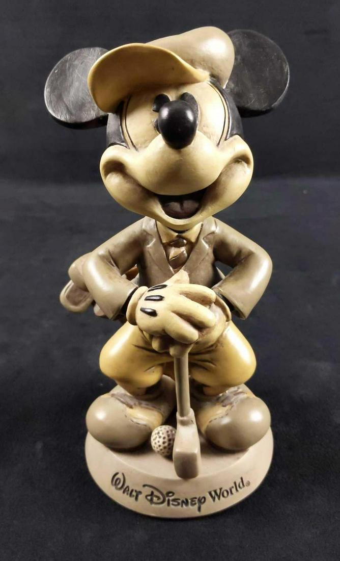 Vintage Disney World Mickey Mouse Golfer Bobblehead: Old Timey Mickey Mouse Golfer Bobblehead. Was originally sold only at the Walt Disney World Resort in Orlando, Florida. Is approx 5" x 4" x 8". Is in good, vintage condition with some dust and some we