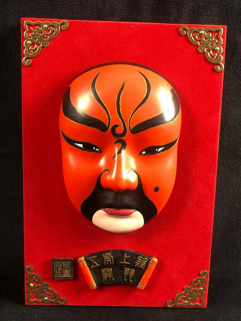 Chinese Art Opera Mask Guan Yu: This is a small hand-painted porcelain mask. Chinese Opera mask Guan Yu. GuanYu in Reunion at Gucheng. The first of the Five Brave Generals of Shu and Marquis of Han ShouTing. There is a plastic stand