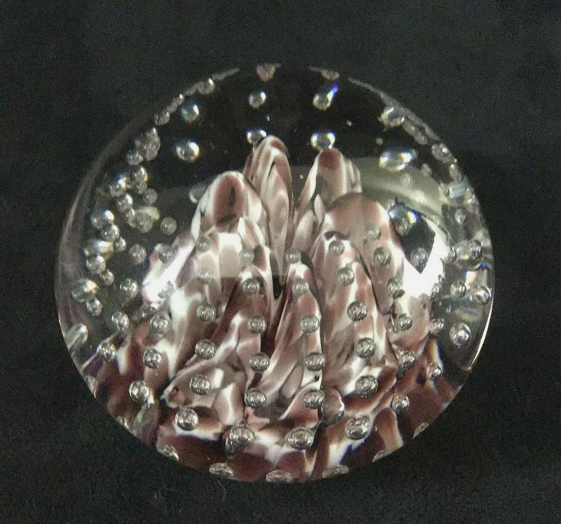 Vintage Glass Art Designer Prestige 1991: Vintage Glass Art Designer Prestige 1991. This is a glass art paperweight. It has marbled purple and white colors in the center with controlled bubbles around. The underside reads "Prestige Glass Art 
