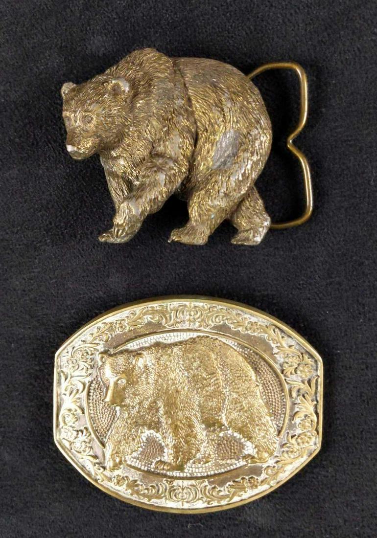 Two Vintage Grizzly Bear Solid Brass Belt Buckles: This beary nice lot includes: (1) Bergamot Brass Works Grizzly Bear Belt Buckle. From 1980. Is approx 3" x 1" x 2 1/2". (1) Award Design Medals Solid Brass Grizzly Bear Belt Buckle. Is approx 3 1/2" x