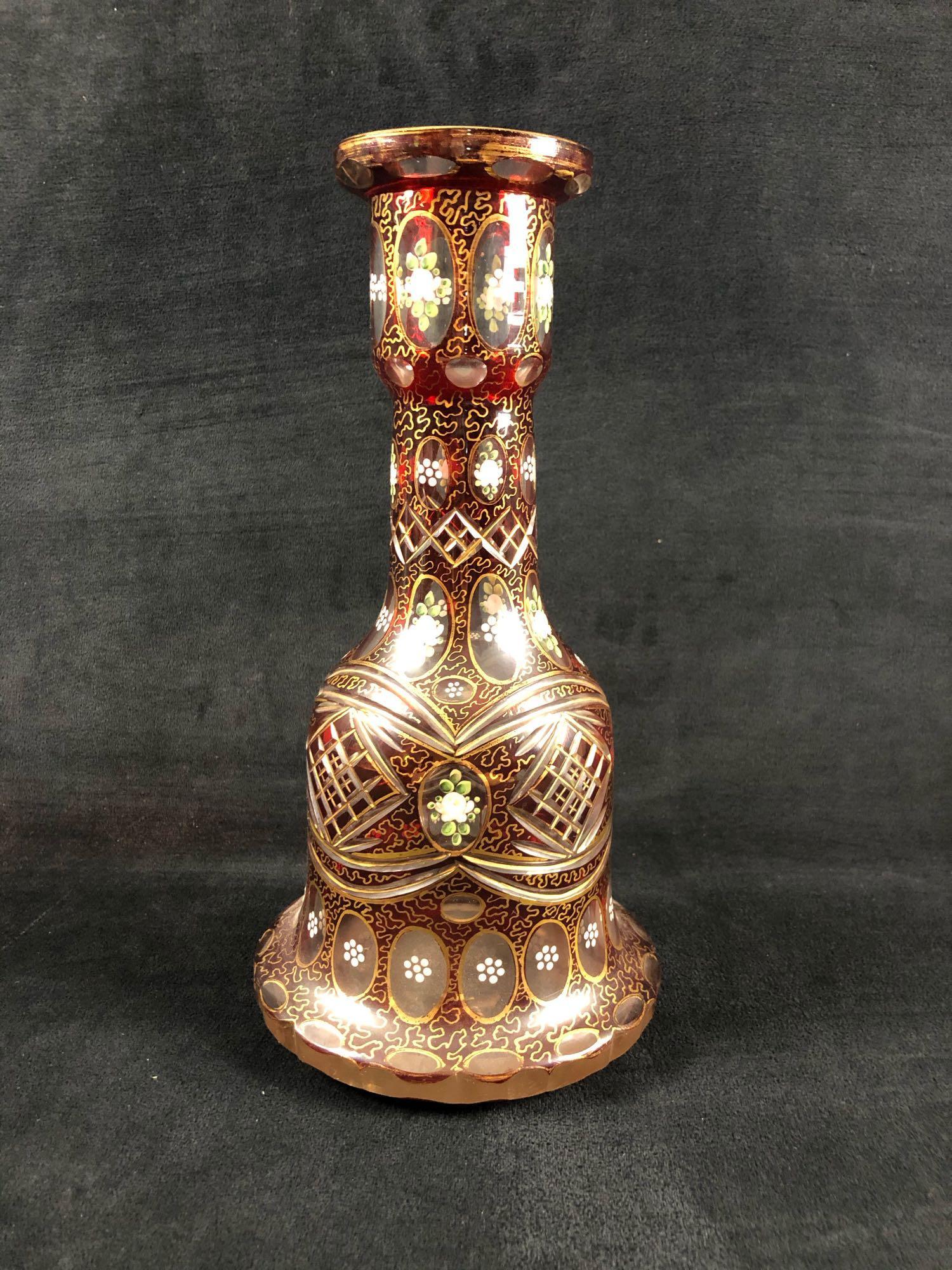Decorative Burgundy Gold Cut to Clear Crystal Bouquet: Decorative Burgundy Gold Cut to Clear Crystal Bouquet Vase White Flowers Home Decor A stylish, ruby red cut to clear, flower vase. The white little floral designs are hand-painted on the clear heavy g