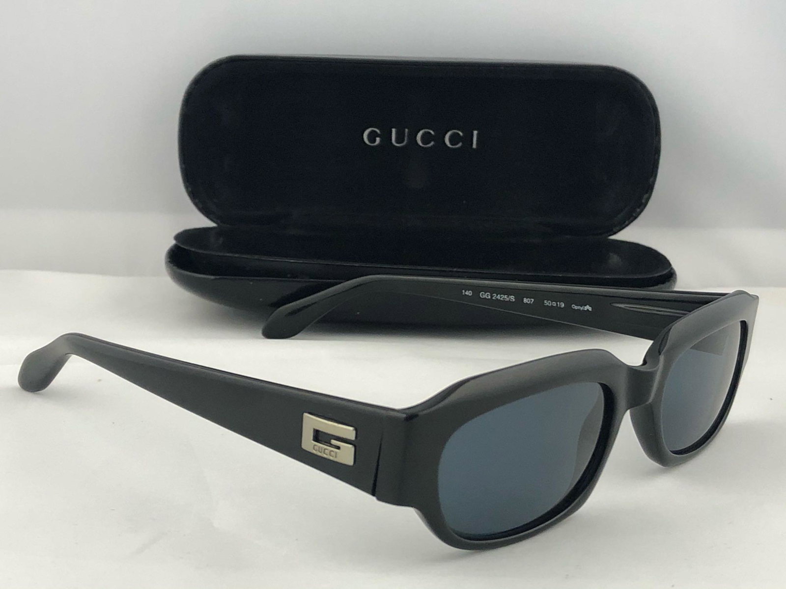 Gucci Black Rectangular Frame W Wide Temples Glasses: Used in Very Good condition with zero scratches on the dark gray lenses Gucci Black Rectangular Frame W Wide Temples Glasses Italy GG245/S 807 includes original case in fair condition and cloth