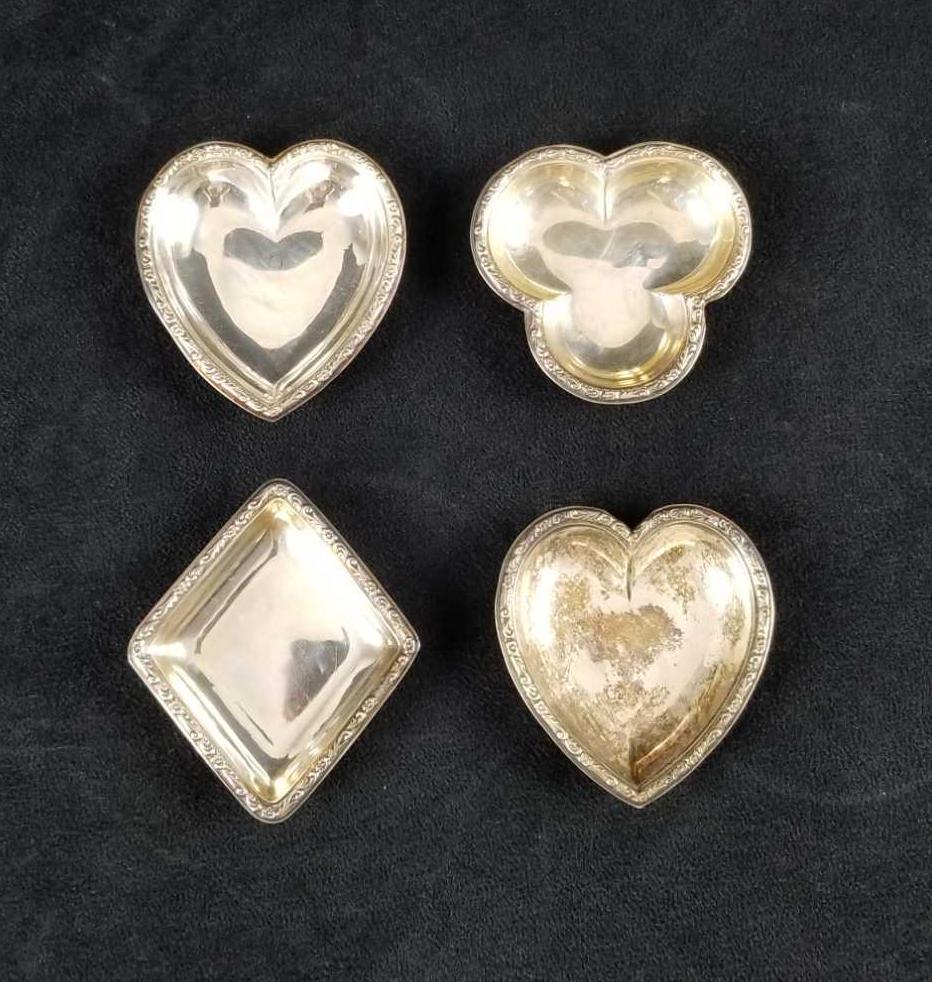 4 Sterling Silver Heart Diamond Clover Trinket Trays: This Sterling Silver Trinket tray lot contains: 2- Hearts stamped with 800 HB on bottom. Approx. measures 2 1/2" x 1/2" x 2 3/4" 1- Diamond has a pin point dent in the bottom approx. measures 2 1/2" x