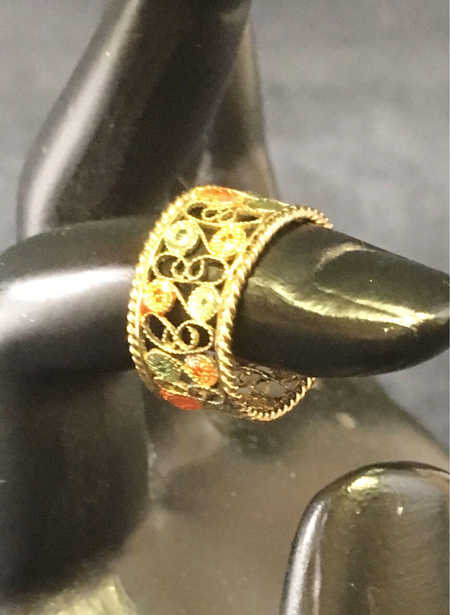 Gold Toned Sterling Flower Ring: Sterling silver gold colored flower ring, weight of 2 grams, size 5