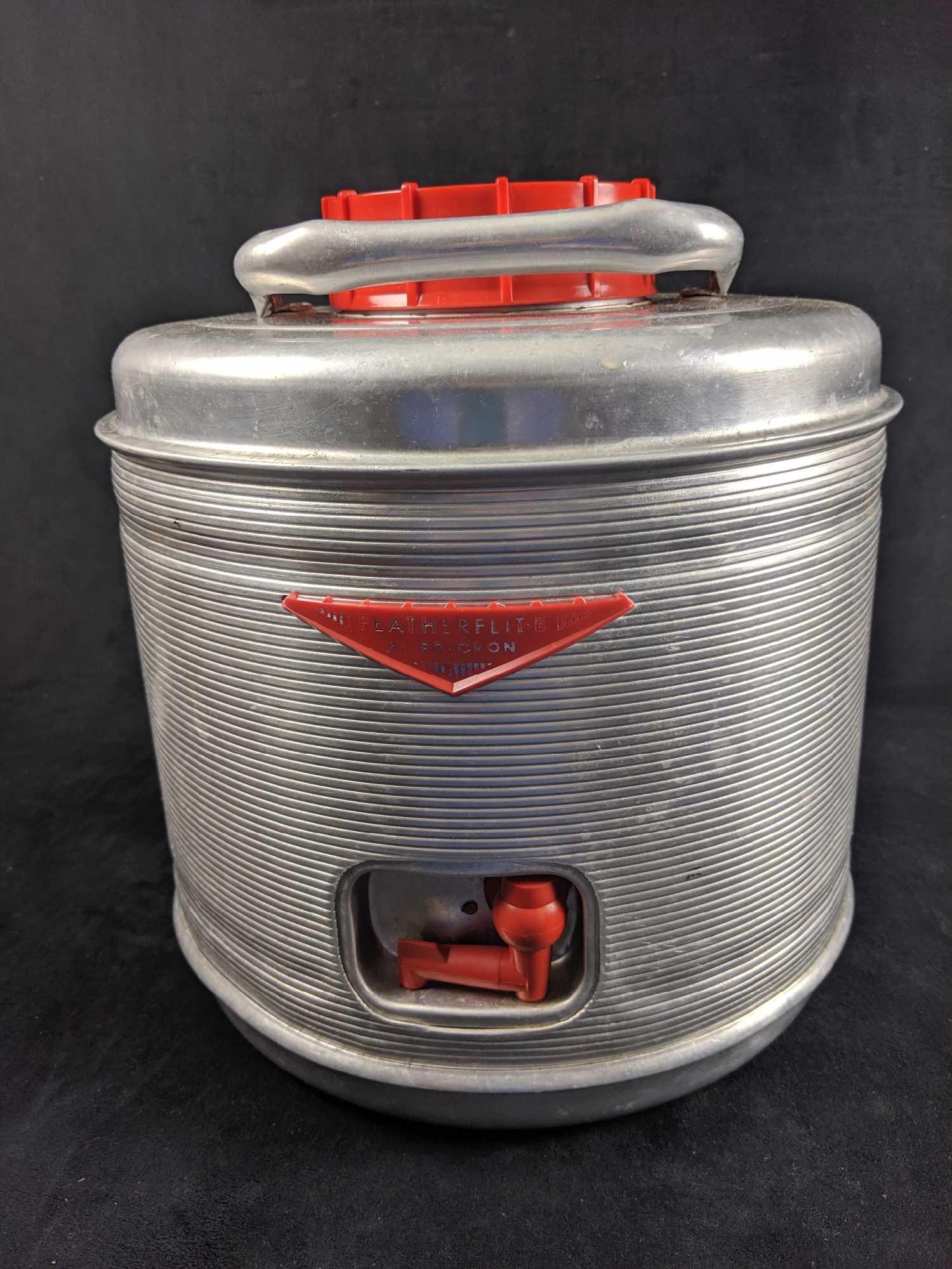 1960s Aluminum Featherflight Water Jug Cooler by: This is for an vintage two gallon water cooler by Poloron. Measures approx 11" x 13". Good, vintage used condition.