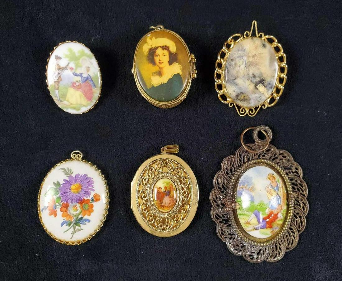 Vintage Fragonard Lot of 6 Pendants and Lockets: Vintage Lot contains: 1- Gold tone, spring loaded locket/pendant with female portrait on top. The is no artist stamp and manufacture is unknown. Oval shape. There is some wear along edges of the portr