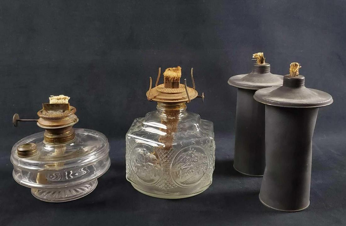 Vintage Glass Oil Lamp Lot Of Four: This lot includes: (1) Vintage Lamplight Farms Glass Oil Lamp from the 1970s. Have unique horse and carriage scenes on the sides of the lamp. Is approx 7" x 7" x 7". It is in good, vintage condition w