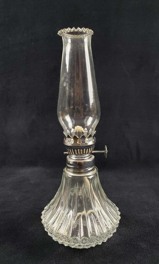 Vintage Farms Lamplight Company Oil Lamp: Vintage oil lamp by Lamplight Farms. Lamp is in good, unused condition with no known damage. Company name is etched on the bottom. Lamp is approx 4" x 4" x 9 1/2".