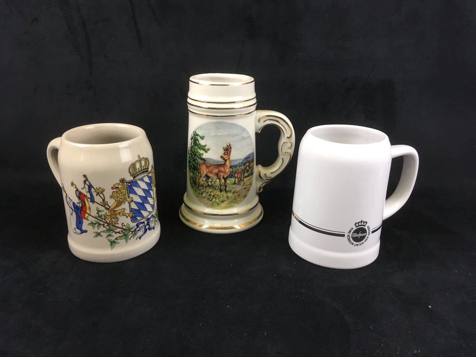 Lot of 3 Vintage German Beer Mugs: Lot of 3 Vintage German Beer Mugs; all in very good condition, all appear to be .5 liter. 1) an earthenware beer mug showing the coat of arms of Bavaria (we believe), it is marked "Burgwindheim, Ofr. 