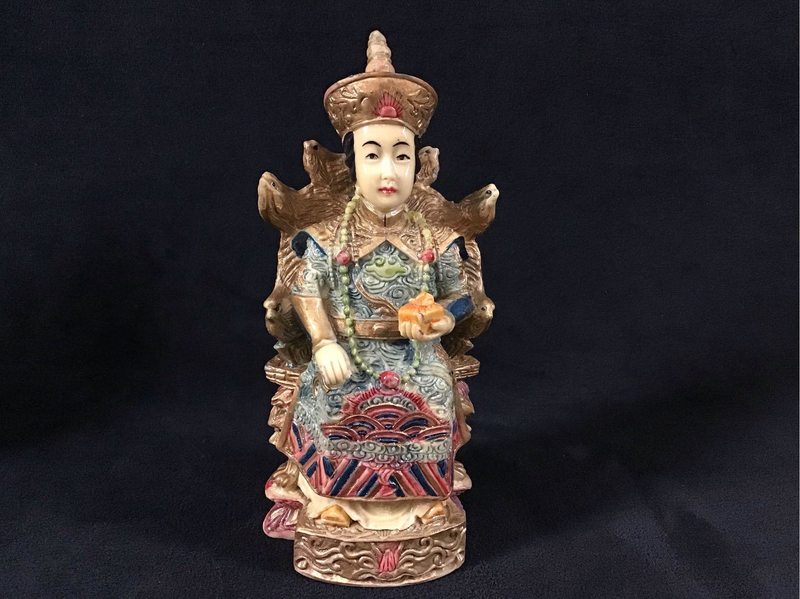 Quan Yin Chinese Art Statue B: Quan Yin Chinese Art Statue A. This is a lot of one statue. Quan Yin is a Buddhism Deity who is also known as the Goddess of Mercy. In Feng Shui it should be placed at least 3 feet above the floor. Th