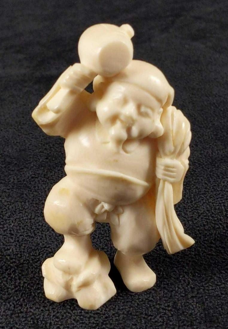 Vintage Hand Carved Bone Chinese Daikokuten Figurine: Well made, a hand-carved bone figurine of Daikokuten who holds his hammer and bag of gold. The maker and date of creation are unknown. The figurine is in good, vintage condition with wearing/light mar