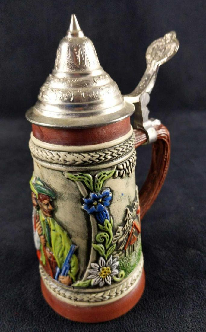 Vintage Original Gerzit Stein Gerz W Lid Hunters: German mini stein with pewter lid. Shows two hunters near a church and cottage. Hand-painted and stamped on the bottom with Gerzit stamp. Is approx 4" x 3" x 6 1/2". Is in good, vintage condition with