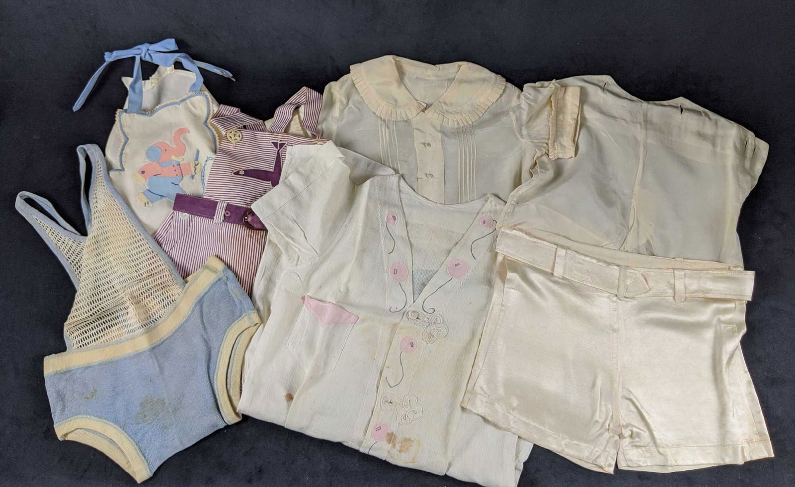 1940s Vintage Handmade Baby Toddler Clothing: This lot includes vintage clothing that range in size-approx 0-12 months. (1) Kaynee Oliver Twist cotton Overalls/romper with purple pinstripe pattern and airplane logo. Comes with belt. Is approx 17"