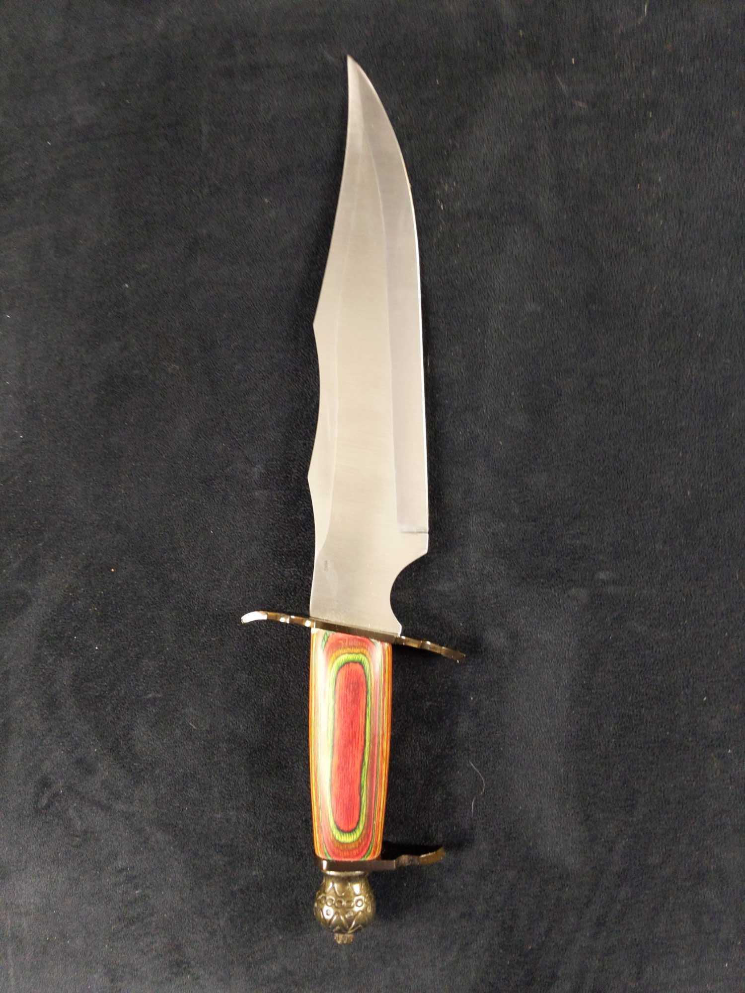 Frost Cutlery Howling Wolf III Steel Bowie Knife: Howling Wolf III by Frost Cutlery. 15" overall Bowie knife. Stainless steel blade with a frost wood handle. Comes with a nylon sheath. Is in good, used condition with some light wearing. Needs a good 